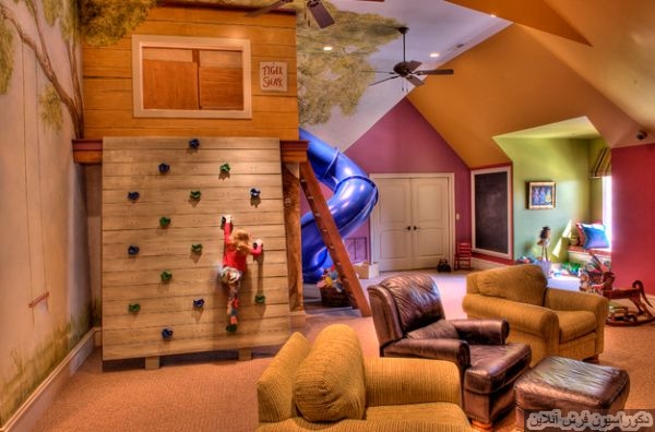 Elaborate-playroom-with-a-super-slide-and-a-climbing-wall